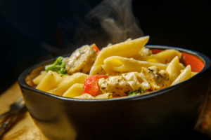 CHICKEN PRIMAVERA SPAGHETTI SQUASH BOATS